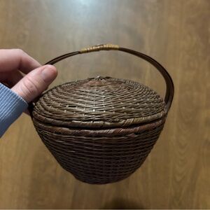 Vintage wicker lidded basket